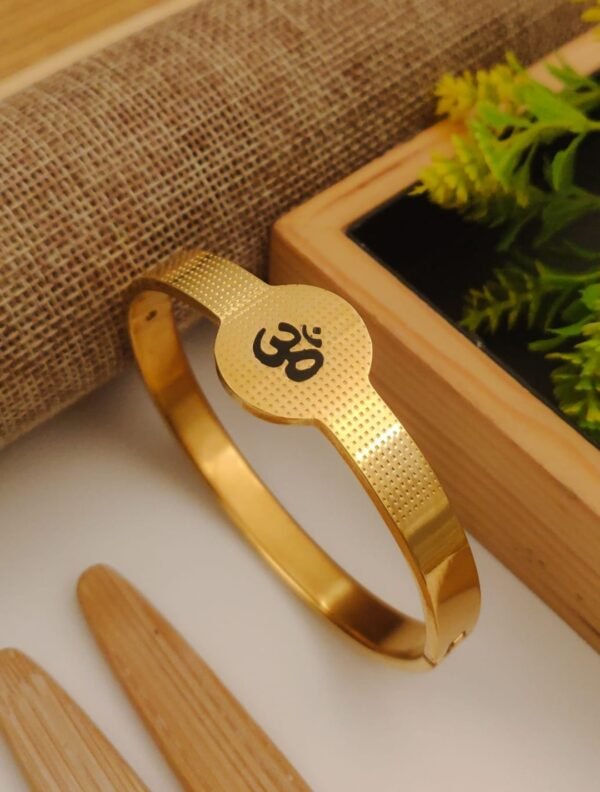 Om Symbol Engraved Golden Steel Kada